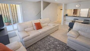 Condo, Multiple Beds, Balcony, Garden View (Habitat 25) | Living area | 40-inch TV with cable channels