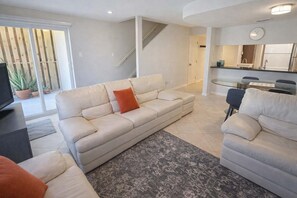 Condo, Multiple Beds, Balcony, Garden View (Habitat 25) | Living area | 40-inch TV with cable channels - Habitat 25 (South Padre Island)