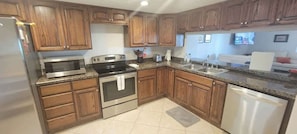 Apartamento, varias camas, balcón, vistas al jardín (Habitat 25) | Cocina privada | Frigorífico, microondas, horno y placa de cocina
