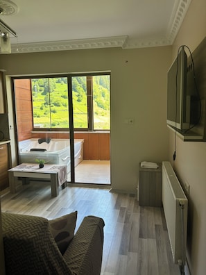 Appartement familial, vue sur le lac | Aire de séjour