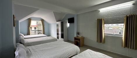 Family Room, 4 Bedrooms | Desk, laptop workspace, free WiFi, bed sheets