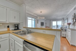 Fridge, microwave, oven, stovetop - Beach House 217, two-bedroom, two-bath ocean front condo (Garden City Beach)