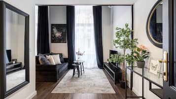 Superior Apartment | Living area | Flat-screen TV