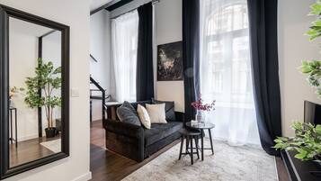 Superior Apartment | Living area | Flat-screen TV