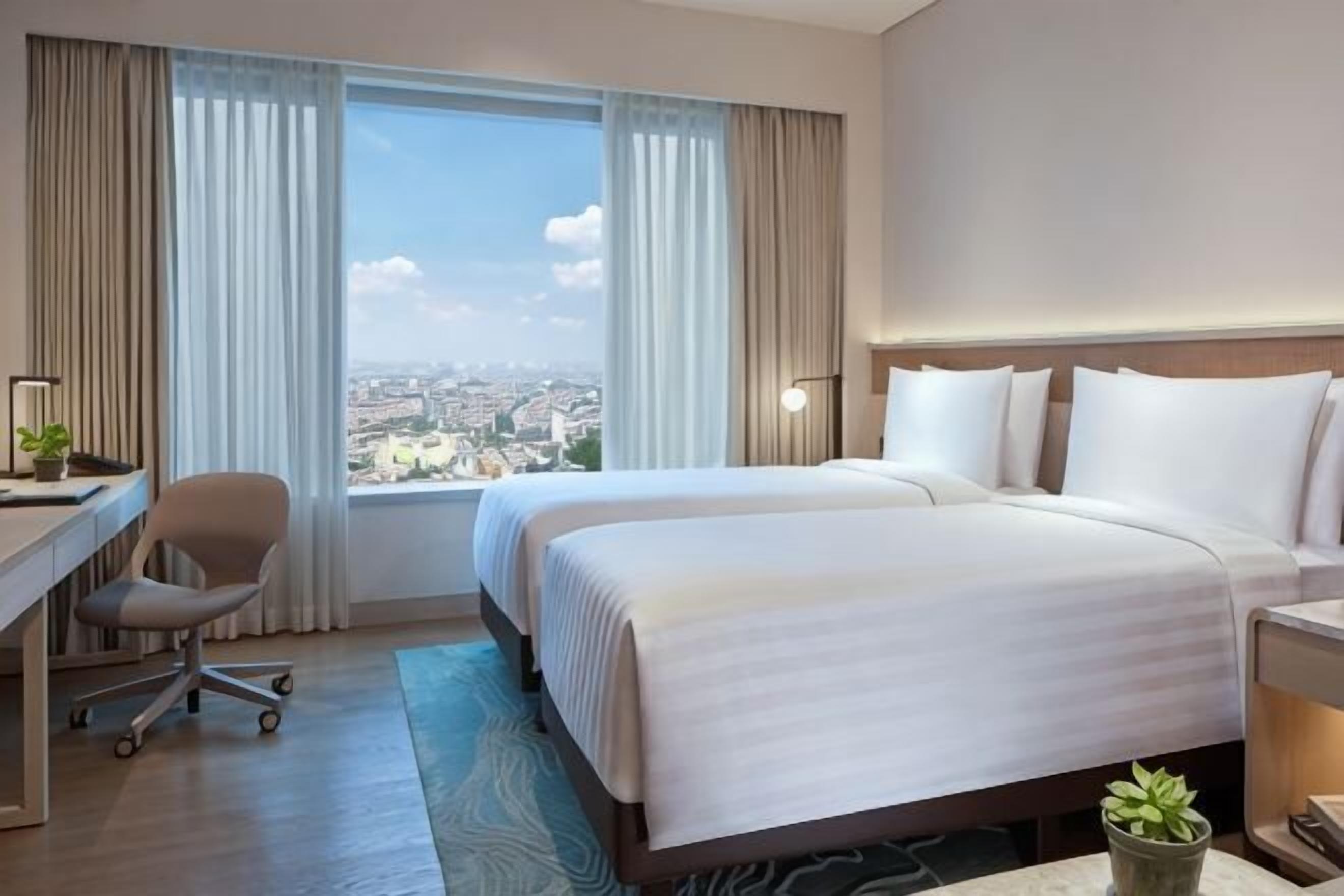 Premium bedding, down duvets, pillow-top beds, in-room safe