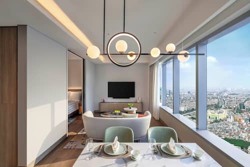 1 Bedroom Executive Suite | Living area | 55-inch Smart TV with cable channels