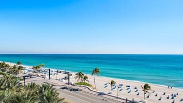 On the beach, sun loungers, beach towels