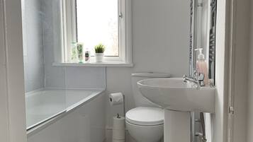 Hair dryer, towels, soap, shampoo