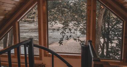 Mid-century modern cowboy retreat with a 35-ft. deck on the Salmon River.