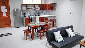 Family Apartment | Private kitchen | Full-size fridge, microwave, oven, stovetop