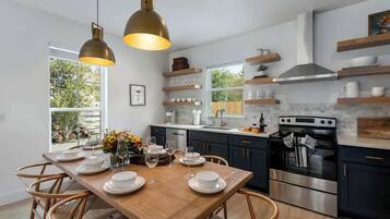 House, Multiple Beds, Hot Tub (306 W Travis Unit A) | Private kitchen | Coffee/tea maker, electric kettle