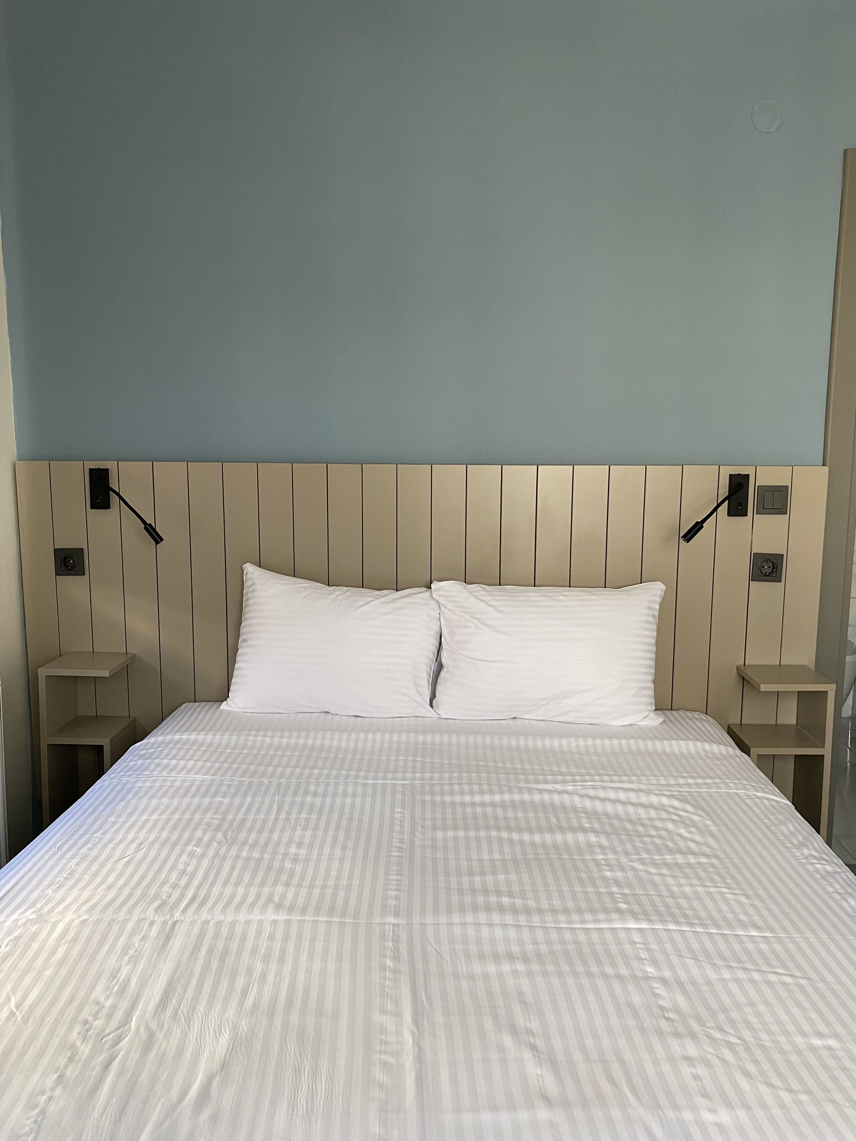 Family Quadruple Room | Minibar, free WiFi, bed sheets