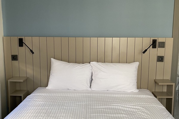 Family Quadruple Room | Minibar, free WiFi, bed sheets