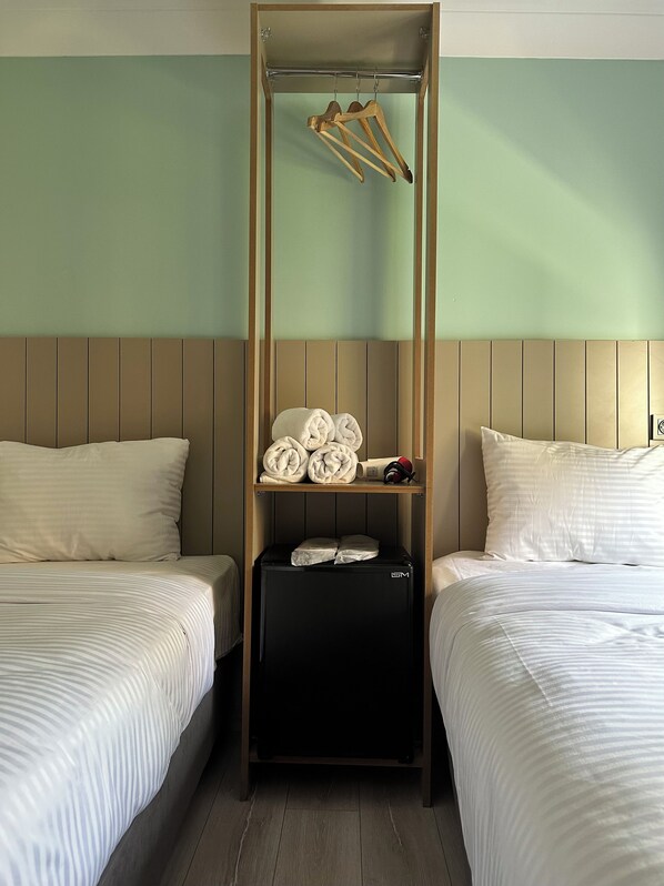 Habitación Deluxe con 2 camas individuales | Minibar, wifi gratis y ropa de cama