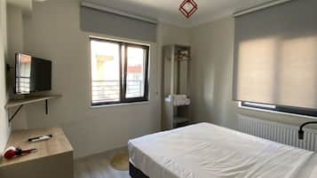 Quarto quádruplo família | Frigobar, Wi-Fi de cortesia, roupa de cama