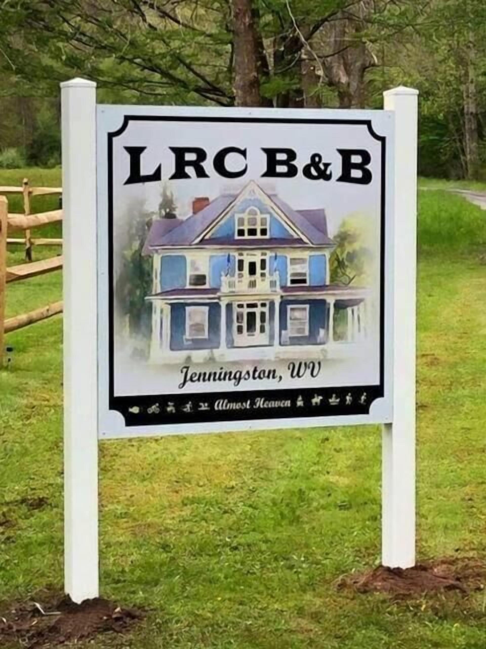 A sign for LRC B&B in Jenningsston, WV, featuring a two-story house illustration.