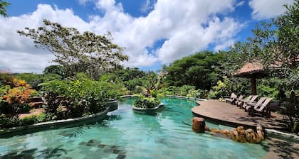 Beautiful tropical farm with spectacular pool located on a river.