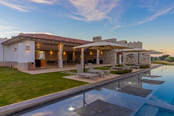 Outdoor pool, pool umbrellas, pool loungers