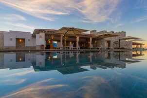 Outdoor pool, pool umbrellas, sun loungers