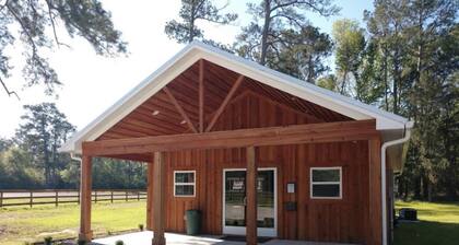 Newly constructed waterfront cabin C1 with pond and Trinity River views