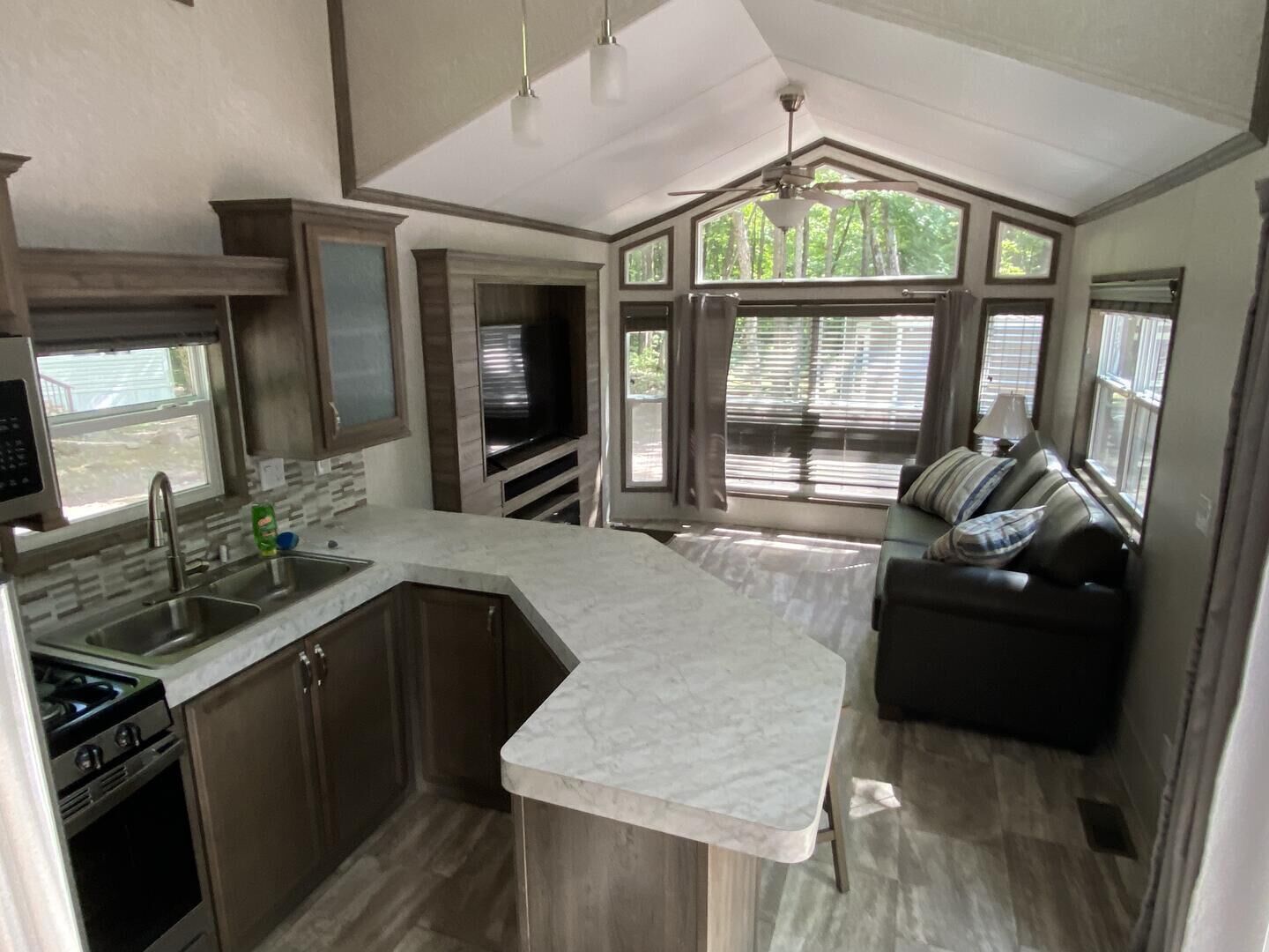 Cabin, Multiple Beds, Kitchen | Private kitchen | Fridge, microwave, stovetop, dishwasher