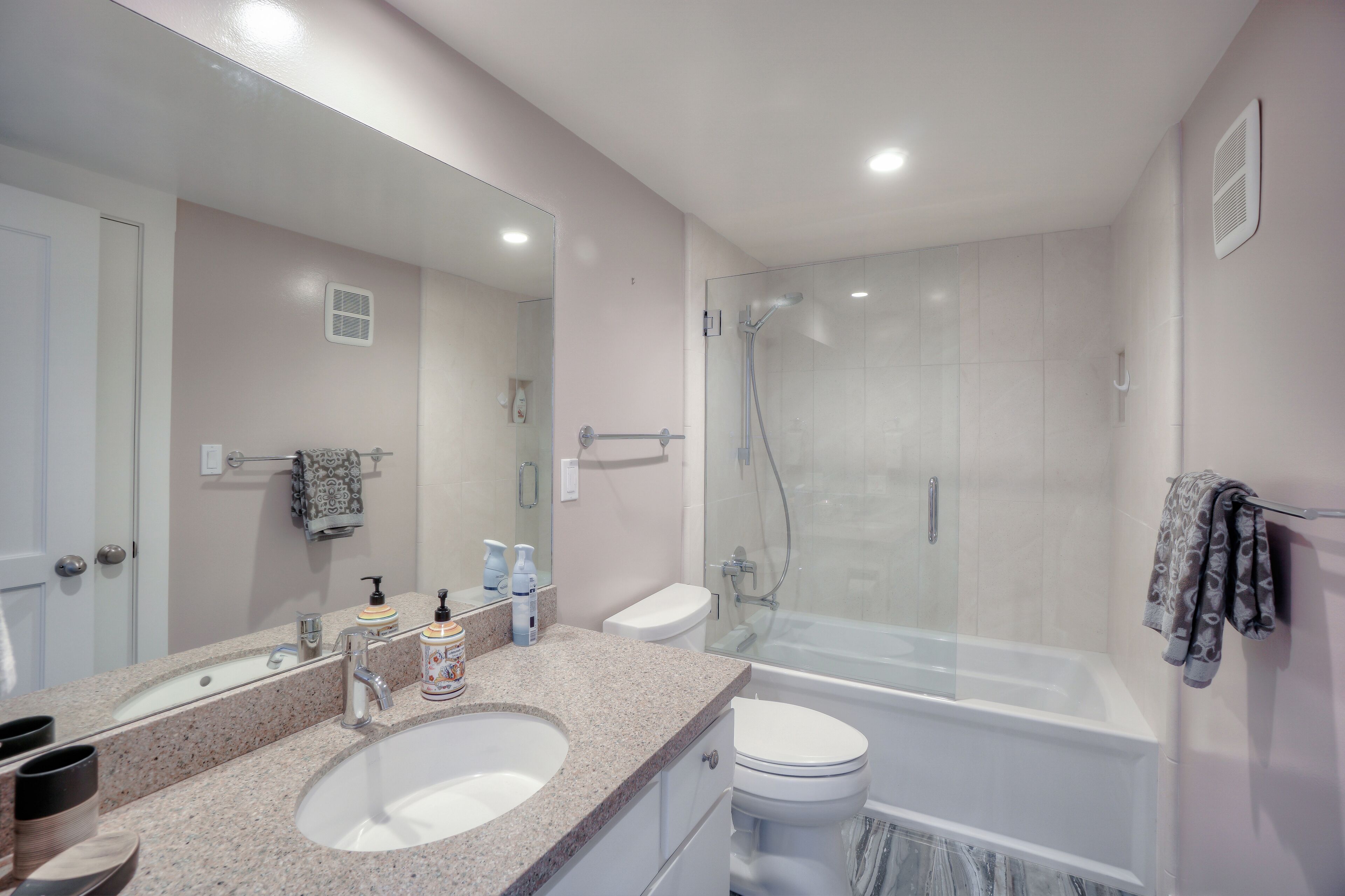Just outside of the third bedroom is the third bathroom.