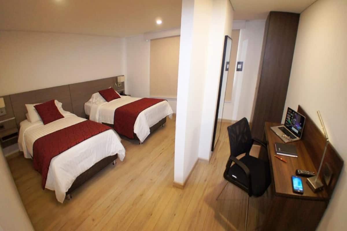 Comfort Twin Room, City View | In-room safe, desk, soundproofing, iron/ironing board
