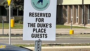 A sign indicating the Duke's Place is reserved for Duke's Place guests. - Brooklynn Suite - Pet Friendly - Dukes Place (Brandon)
