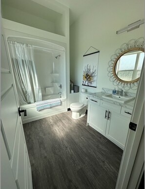 Bathtub, hair dryer, towels