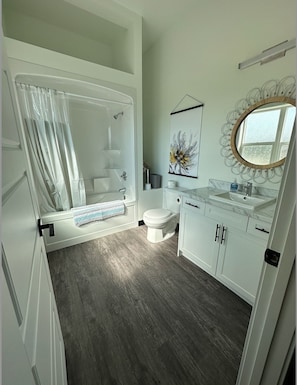 Bathtub, hair dryer, towels