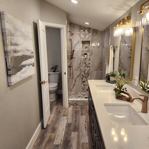 Shower, hair dryer, towels, soap