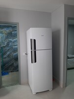 Apartamento | Cocina privada | Frigorífico grande, licuadora y utensilios de cocina