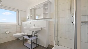 Dusj, hårføner og håndklær
