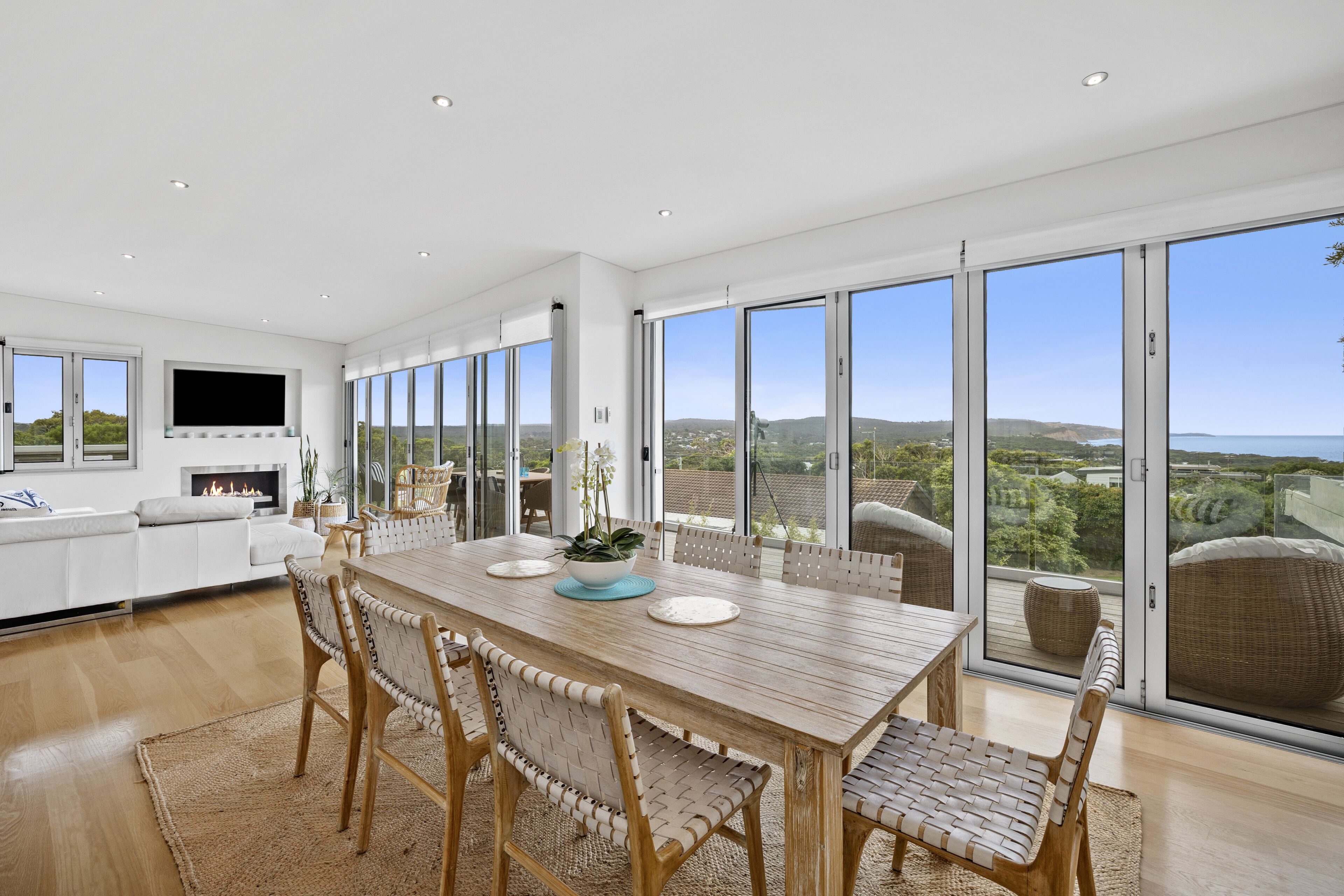 Lovely dinning living area, ajoining kitchen and 2 balconies with gas fire place