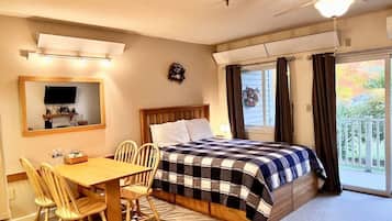 1 bedroom, desk, iron/ironing board, travel crib