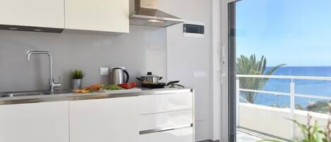 Fridge, microwave, cookware/dishes/utensils