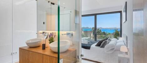Bathtub, hair dryer, towels