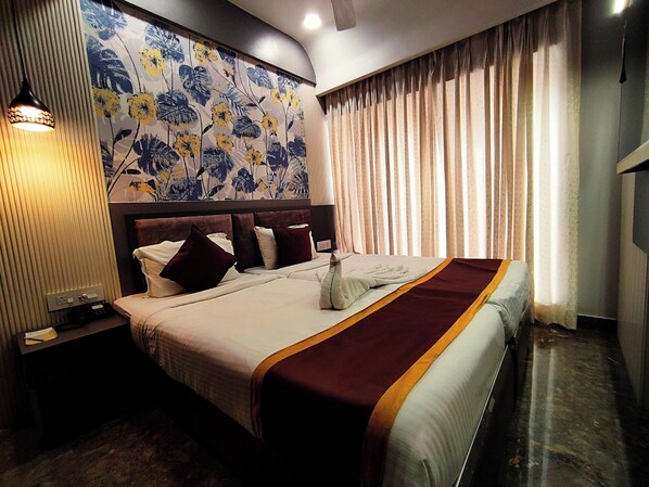 Habitación ejecutiva | Sábanas de algodón egipcio y ropa de cama de alta calidad 