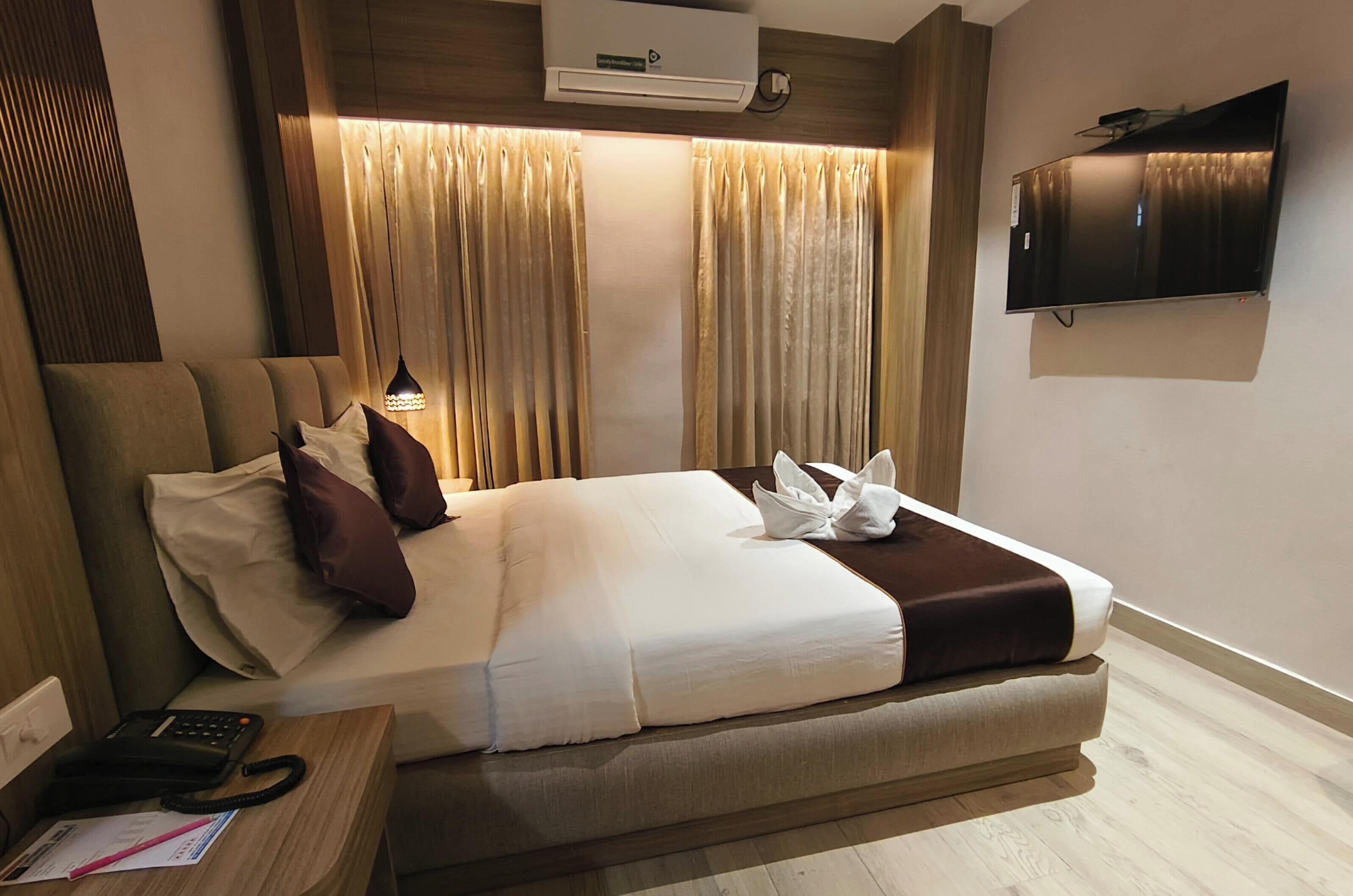 Chambre Double Deluxe | Draps en coton égyptien, literie de qualité supérieure