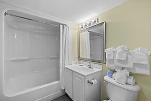 Baignoire, séchoir à cheveux
