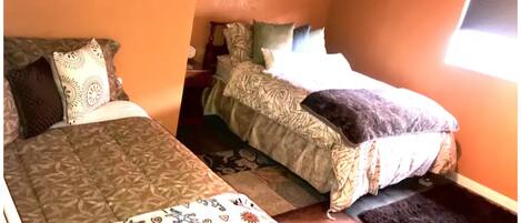 1 غرفة نوم ومكواة/لوح كي وواي فاي وملاءات أسرّة