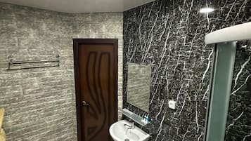 City Triple Room | Bathroom | Separate tub and shower, rainfall showerhead, designer toiletries