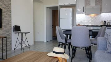 Family Apartment, 2 Bedrooms | Living area | 43-inch LED TV with satellite channels