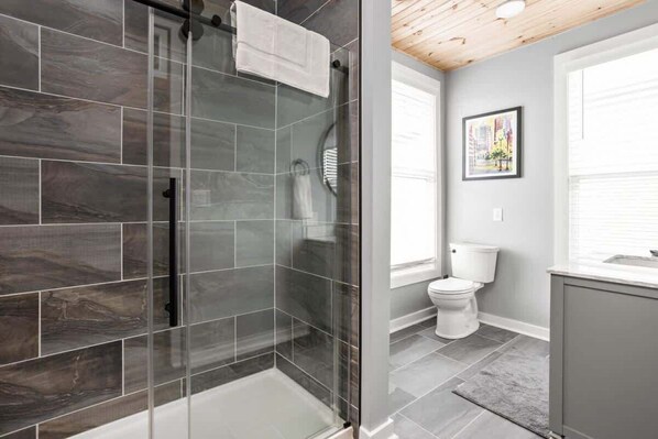 Bathtub, hair dryer, towels