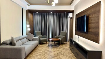 Comfort Apartment, 2 Bedrooms | Living area | 108-cm plasma TV with digital channels