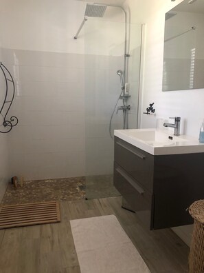 Shower, towels, soap, toilet paper