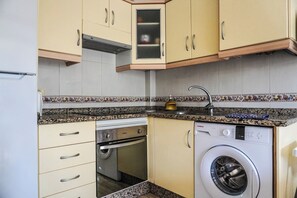 Fridge, microwave, coffee/tea maker, toaster