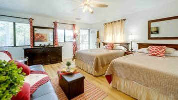 Laptop workspace, bed sheets