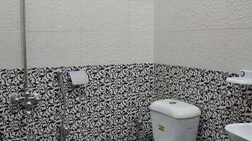 Deluxe Double or Twin Room | Bathroom | Shower, designer toiletries, towels, soap