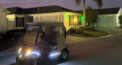 WOW CLOSED IN COURTYARD VILLA, GOLF CART, 2 BEDROOMS AND WALK TO 5 LOCAL POOLS.